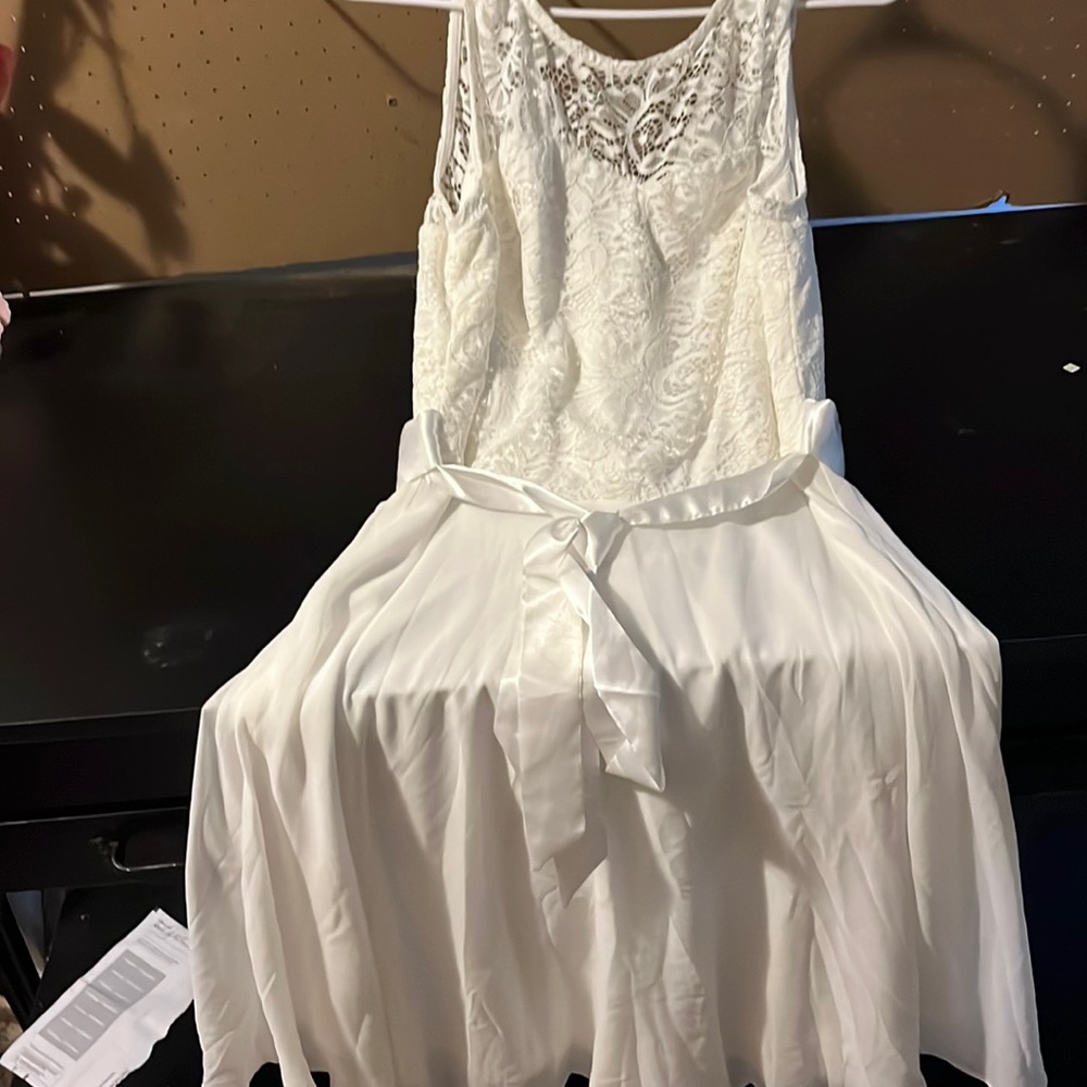 It’s a white wedding dress that was supposed to be my girls when she married me